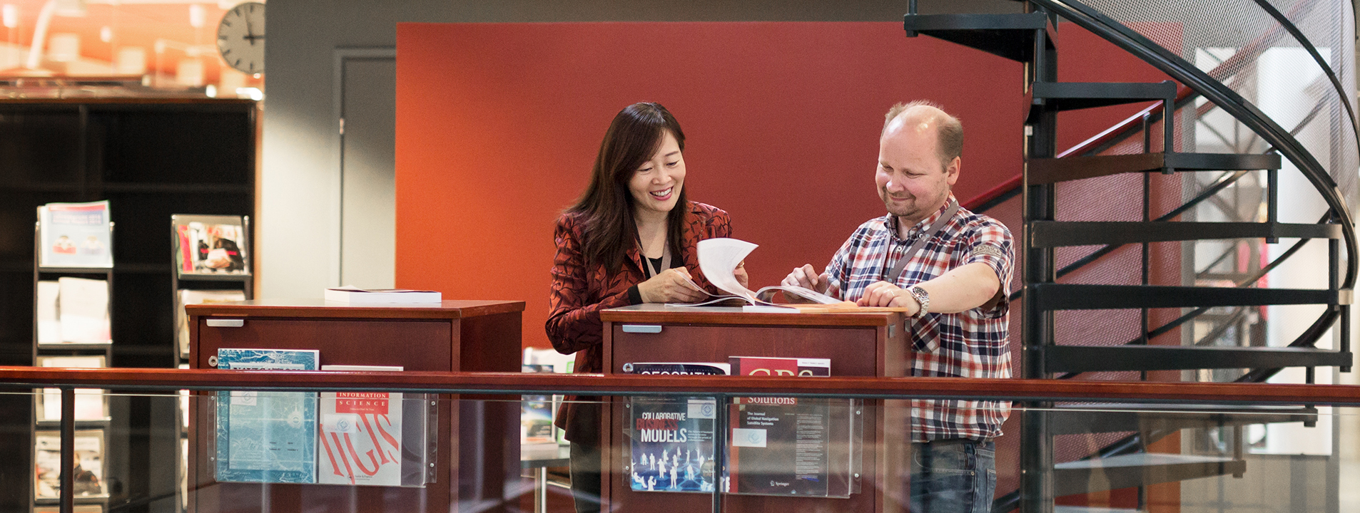 Researchers in the library.