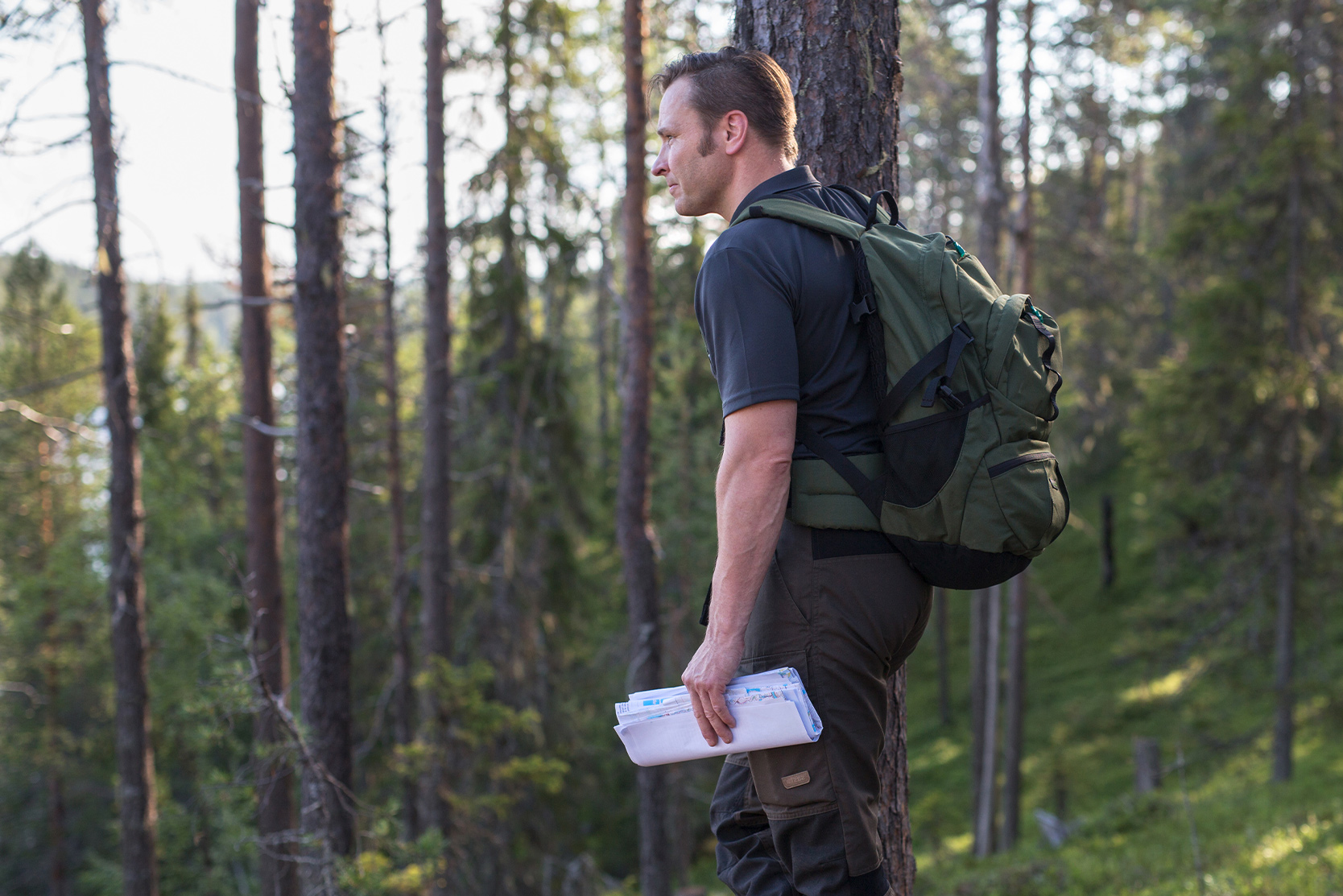 A person walking in a forest.