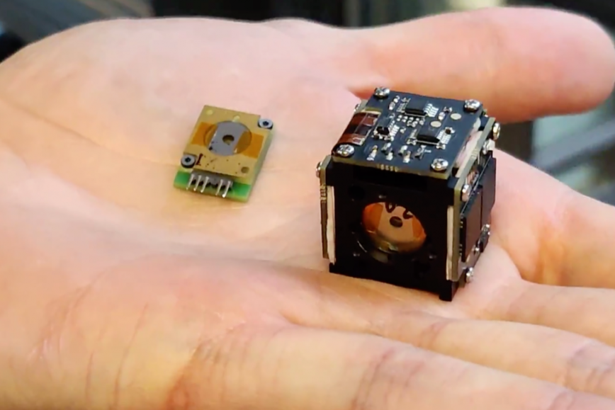 A miniature hyperspectral imager on a palm.