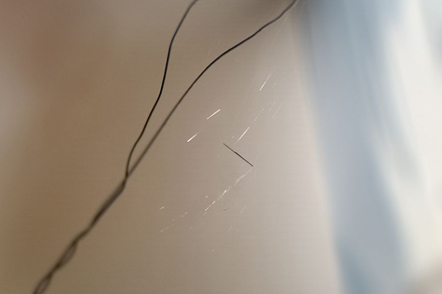 Small space debris can be attached to spider web for measurement.