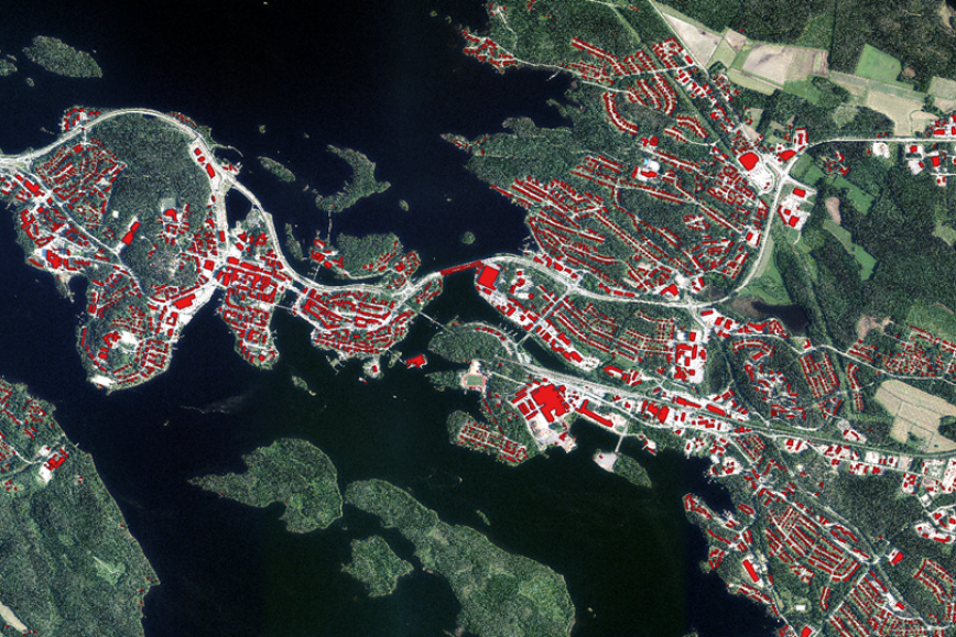 Aerial picture that shows buildings and water.