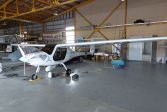 Electric aeroplane in a hangar