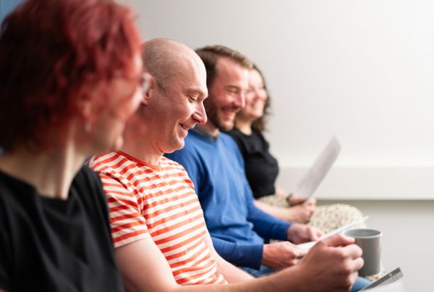 Happy people in a meeting.